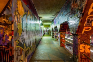 This tunnel, which is often traversed by cars, bikes and pedestrians is often covered in graffiti art.